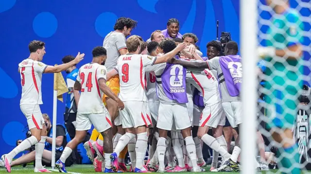 Anthony Gordon of England celebrates with teammates after scoring his team's first goal during the FIFA World Cup 2026 Semi Final match between England and Argentina at Atlanta Stadium on July 15, 2026 in Atlanta, United States