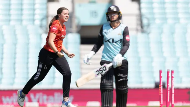 Grace Ballinger celebrates taking wicket of Danni Wyatt-Hodge