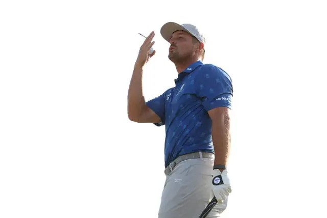 Bryson DeChambeau of the United States blows a kiss to the fans