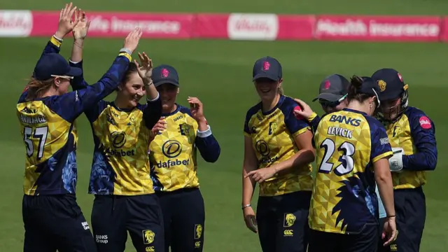 Durham celebrate the wicket of Georgia Adams