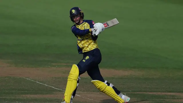 Grace Thompson hits a boundary
