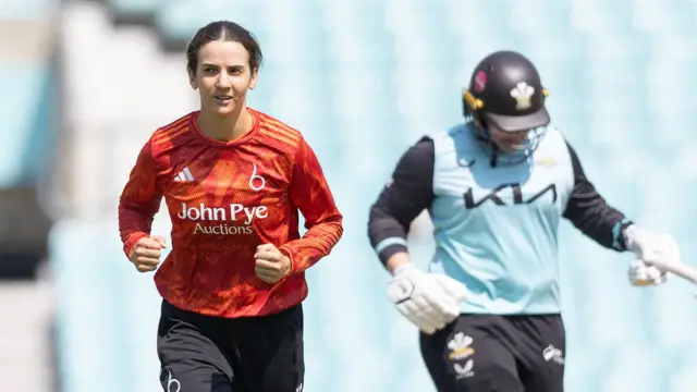 Charli Knott celebrates wicket of Bryony Smith