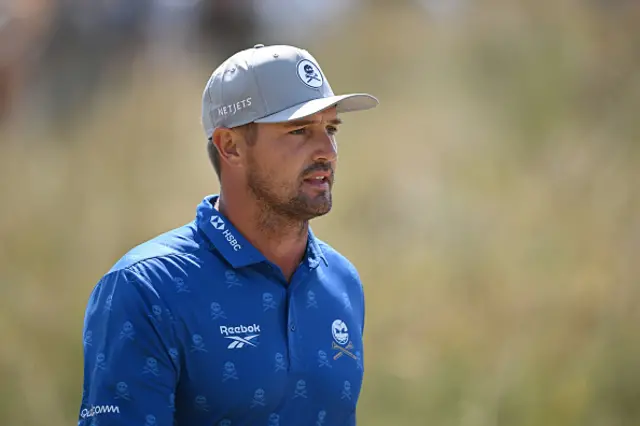 Bryson DeChambeau of the United States walks off