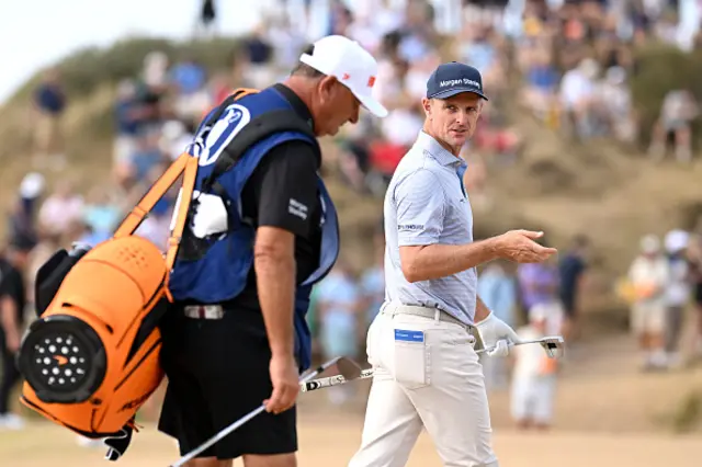 Justin Rose of England looks across