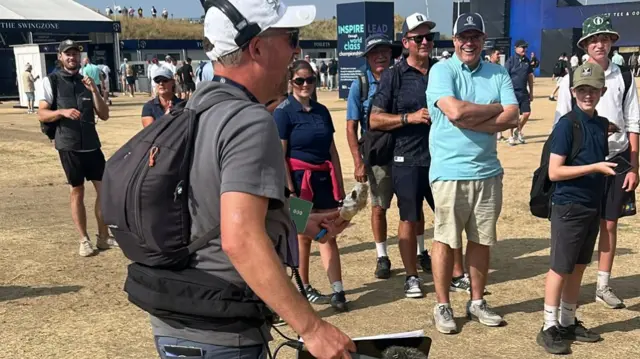 Graeme Storm with an ice cream covered in grass