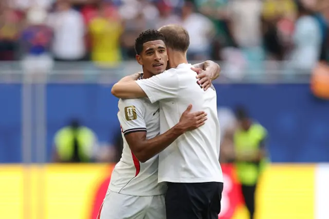Jude Bellingham #10 of England celebrates with Thomas Tuchel
