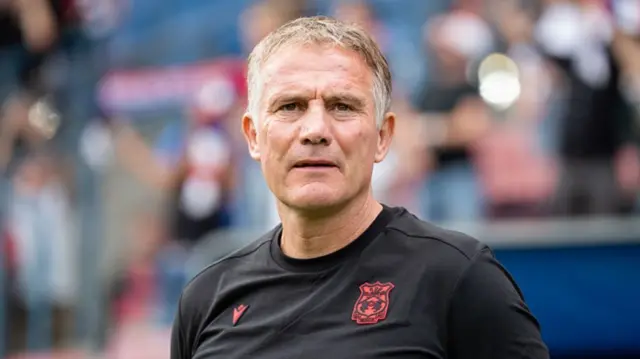 Wrexham manager Phil Parkinson looks on from the touchline