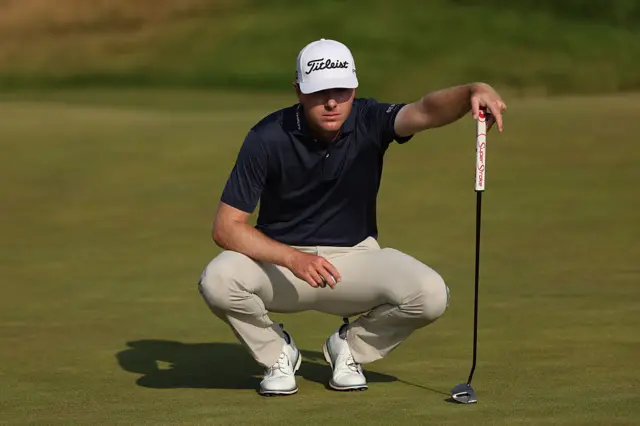 Ryan Gerard weighs up a putt