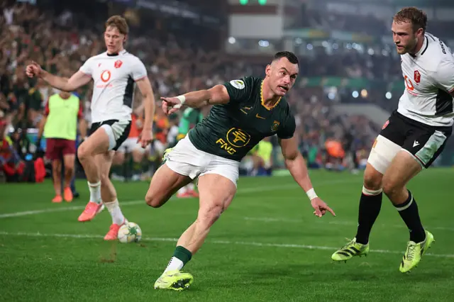 Jesse Kriel of South Africa celebrates scoring his team's third try