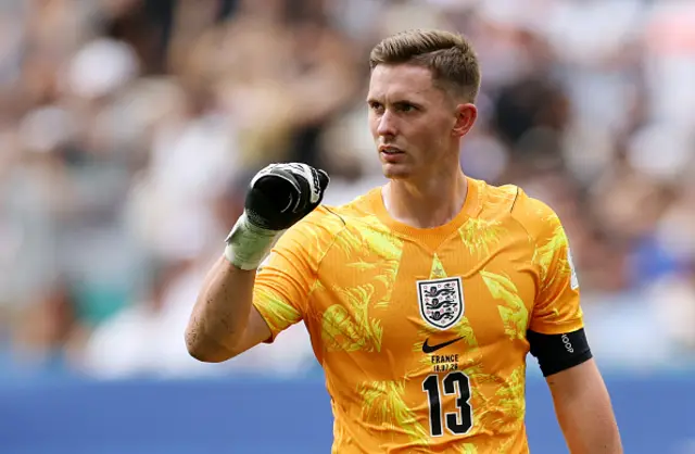 Dean Henderson #13 of England celebrates