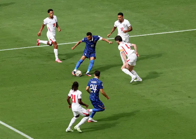 Kylian Mbappe #10 of France takes a shot