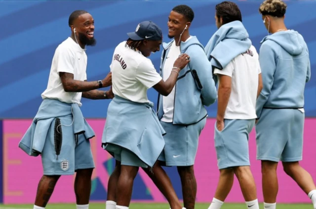 England's Ezri Konsa with Ivan Toney and teammates on the pitch