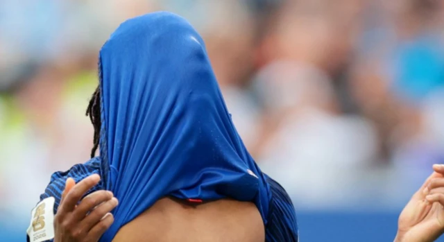 France's Michael Olise reacts after missing a chance to score