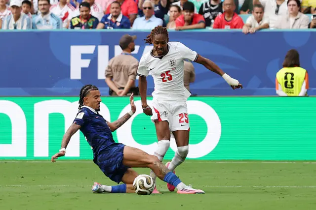 Djed Spence #25 of England is fouled by Malo Gusto