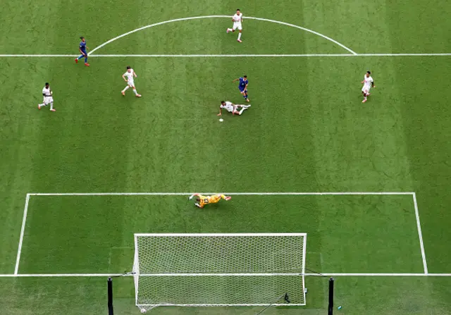 Kylian Mbappe #10 of France scores