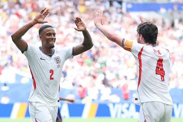 Ezri Konsa #2 of England celebrates with teammate Declan Rice