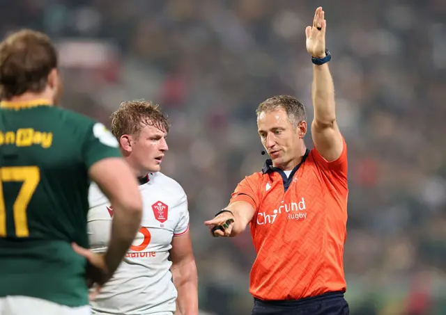Jac Morgan gets a team warning from the referee