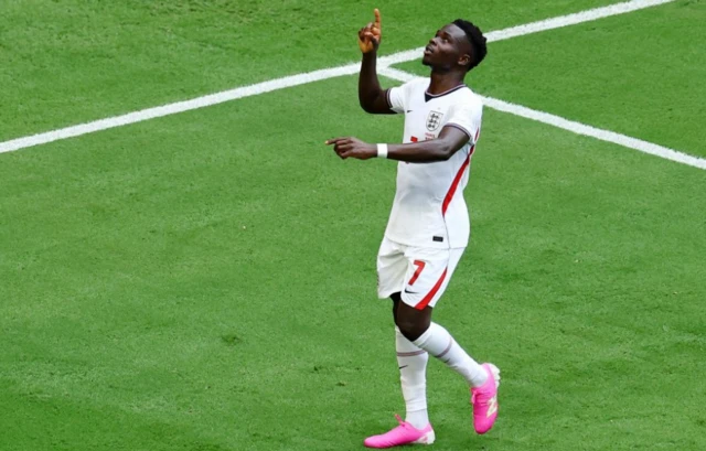 England's Bukayo Saka celebrates scoring their fourth goal
