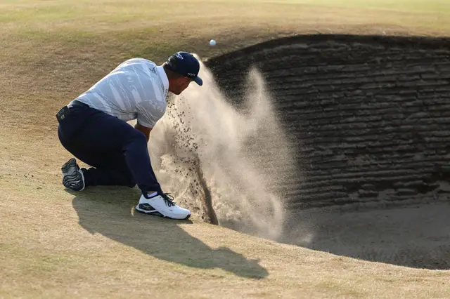 Bryson DeChambeau hits out of the bunker