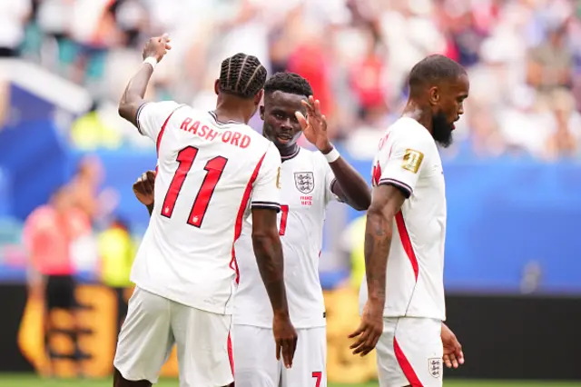 Bukayo Saka of England celebrates after scoring his team's third