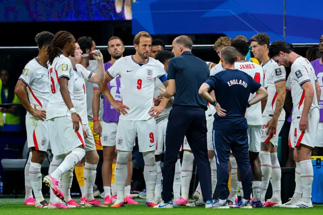 Thomas Tuchel, Head coach of England speaks to Harry Kane