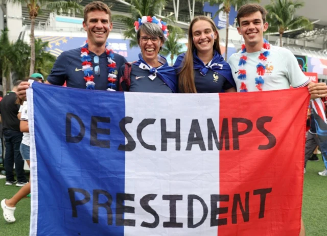 France fans hold up a sign in support of France coach Didier Deschamps