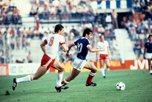French forward Gerard Soler (R) vies with Poland's player (L) during the 1982 World Cup football match between Poland and France