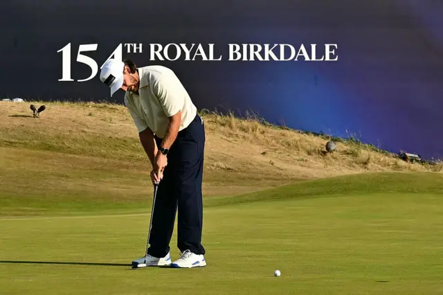Tommy Fleetwood makes a putt