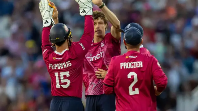 Calvin Harrison celebrates taking wicket