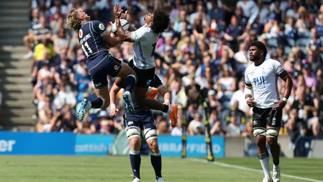 Duhan van der Merwe catches a kick ahead for Scotland to help set up a try