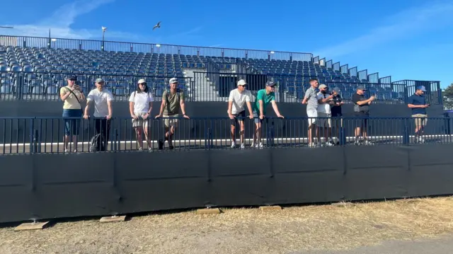 Spectators watching at the range
