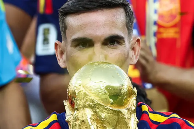 Fabian Ruiz kisses the trophy