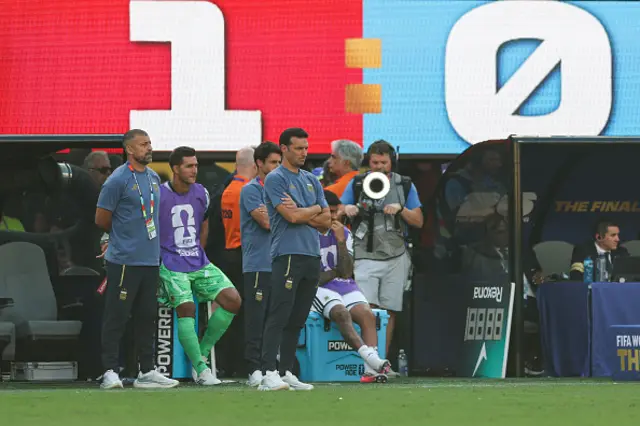Lionel Scaloni watches his players from the touchline