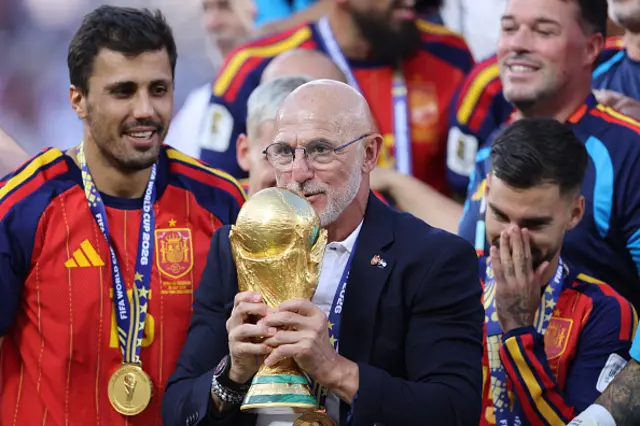 Luis de la Fuente, Head Coach / Manager of Spain lifts the FIFA World Cup Trophy