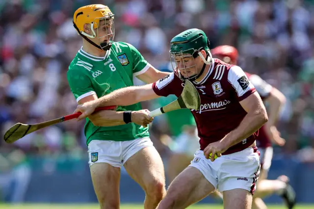 Galway's Gavin Lee is tackled by Limerick's Adam English