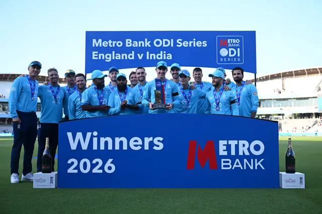 Harry Brook of England and his team mates celebrate victory in the 3 match series