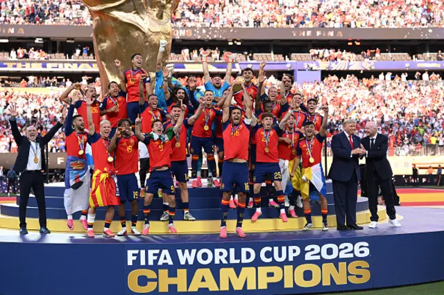 Rodri #16 of Spain lifts the FIFA World Cup Winner’s Trophy
