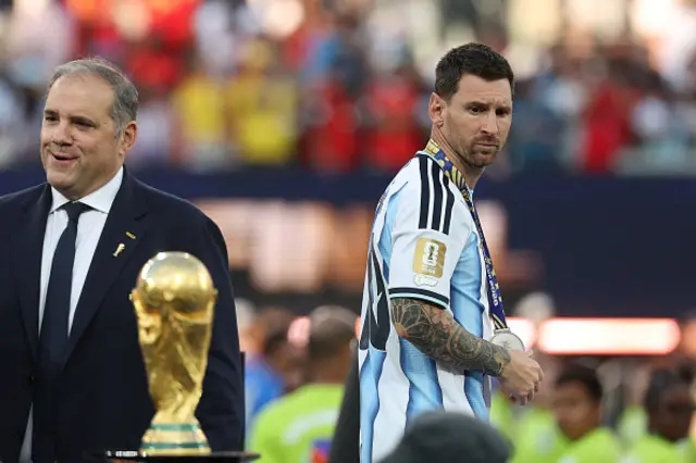 Lionel Messi #10 of Argentina receives his runner-up medal