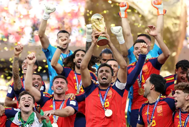 : Rodri #16 of Spain lifts the FIFA World Cup Winner’s Trophy