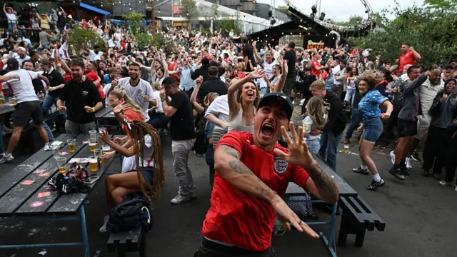 England fans celebrate in Manchester