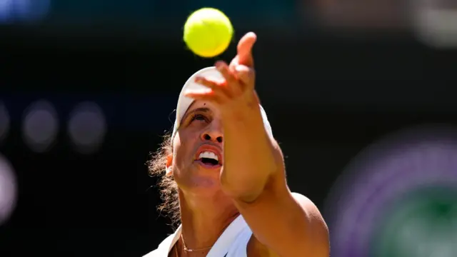 Madison Keys serves