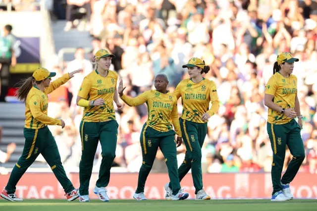 Nonkululeko Mlaba of South Africa celebrates with her teammates after taking wicket of Nat Sciver-Brunt