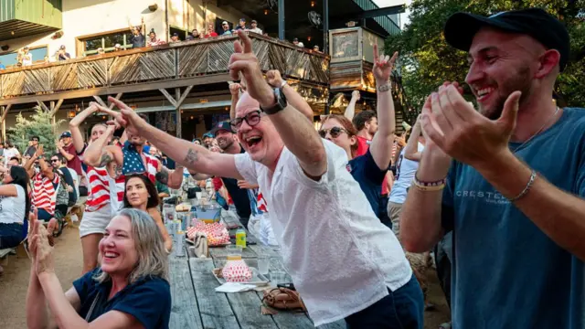 USA fans celebrate at the Armadillo Den in Austin, Texas