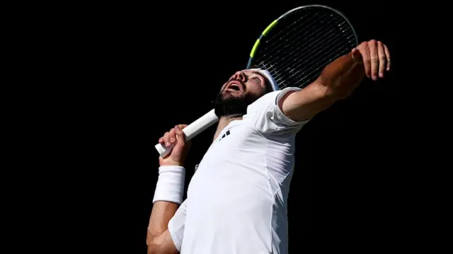 Jacob Fearnley serves
