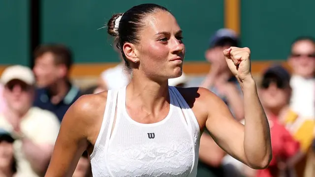 Marta Kostyuk celebrates