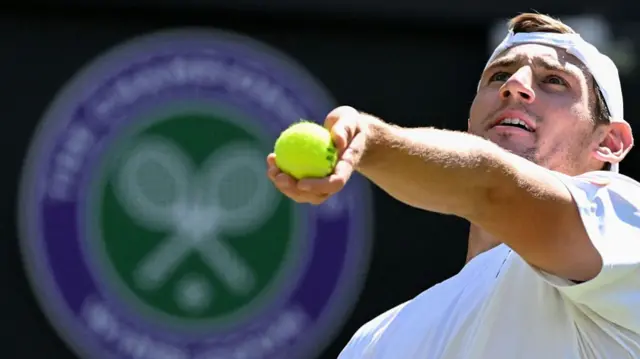 France's Valentin Royer serves