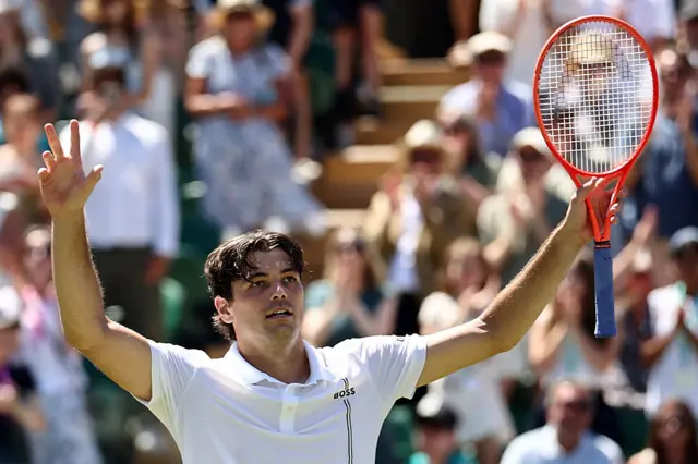 Taylor Fritz celebrates