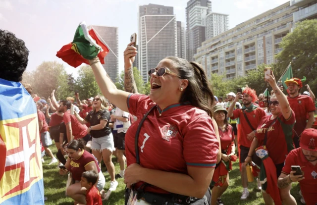 Portugal fans gather before the march to the stadium