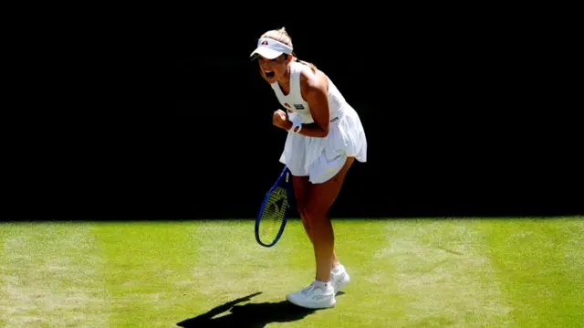 Katie Swan celebrates