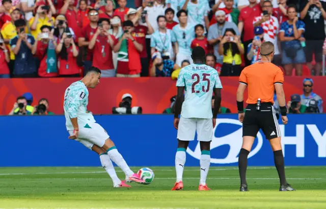 Portugal's Cristiano Ronaldo shoots at goal from a free-kickre